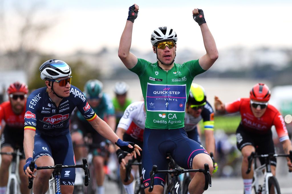 FARO PORTUGAL FEBRUARY 18 Fabio Jakobsen of Netherlands and Team QuickStep Alpha Vinyl green points jersey celebrates winning ahead of Tim Merlier of Belgium and Team AlpecinFenix during the 48th Volta Ao Algarve 2022 Stage 3 a 2114km stage from Almodvar to Faro VAlgarve2022 on February 18 2022 in Faro Portugal Photo by Luc ClaessenGetty Images