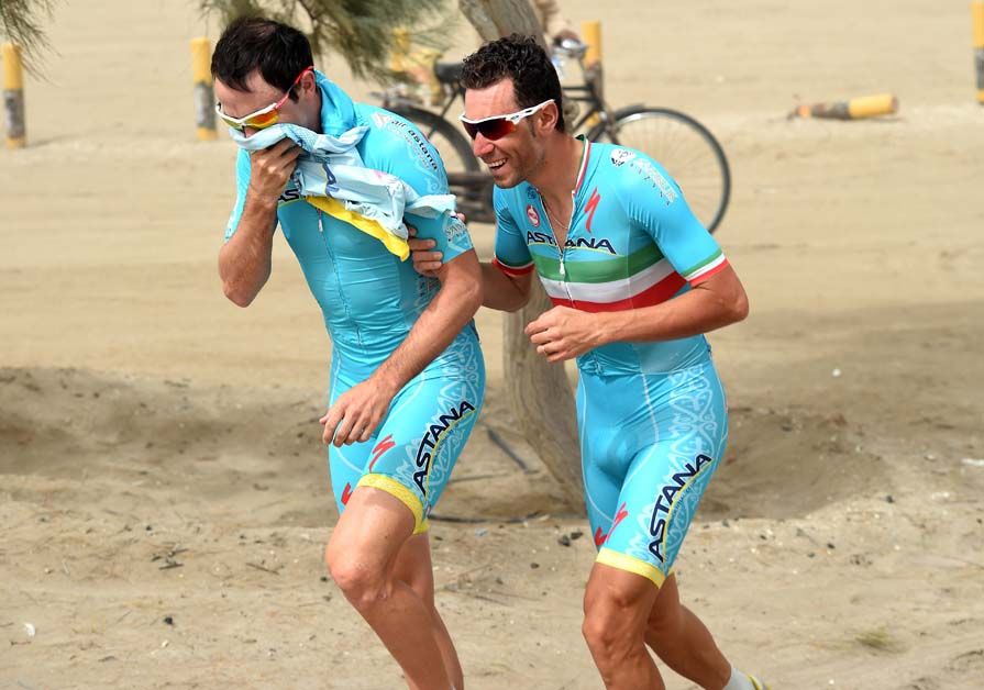 Borut Bozic helps Vincenzo Nibali to safety ahead of the cancelled stage 5 at the Tour of Oman
