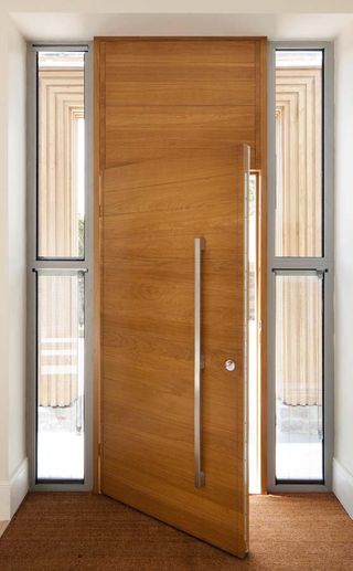 oversized front door in project by Urban Front