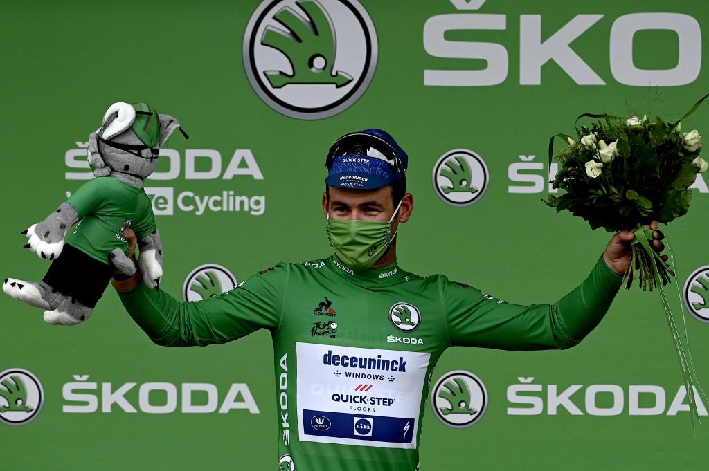 Team Deceuninck Quicksteps Mark Cavendish of Great Britain celebrates his green jersey of best sprinter on the podium at the end of the 5th stage of the 108th edition of the Tour de France cycling race a 27 km time trial between Change and Laval on June 30 2021 Photo by Philippe LOPEZ AFP Photo by PHILIPPE LOPEZAFP via Getty Images
