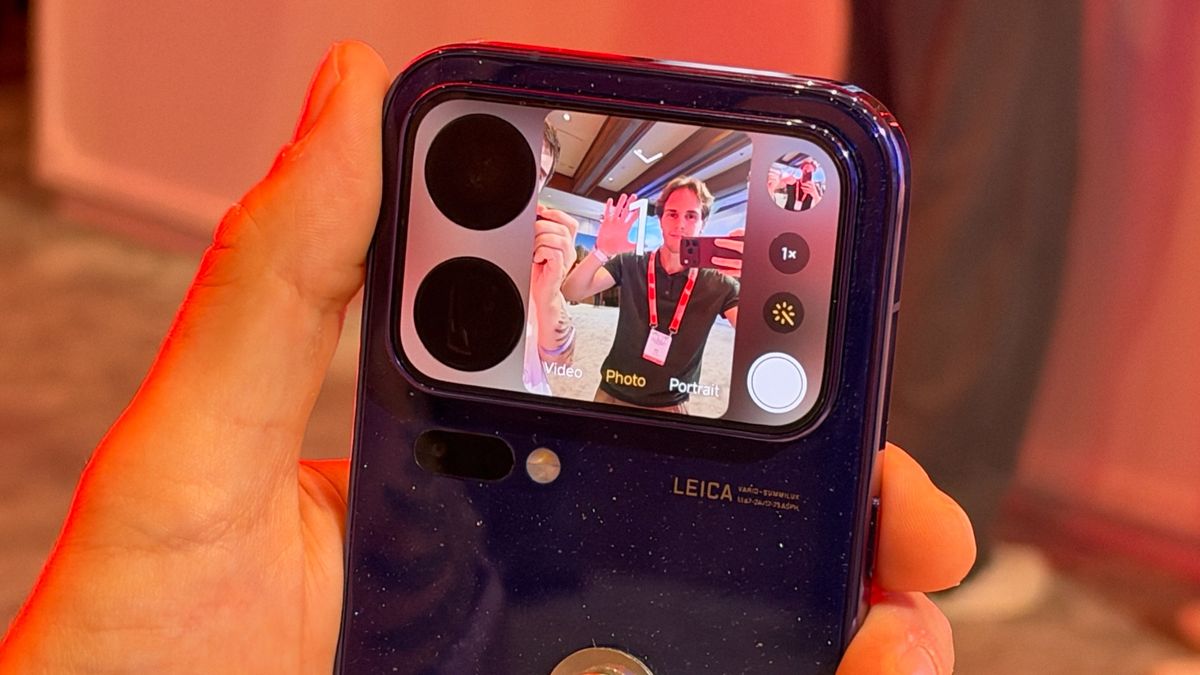 The Xiaomi 18 Pro being held in the hand