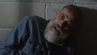 Negan in a jail cell in The Walking Dead.