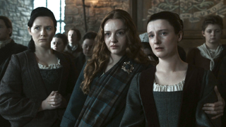 ellen and relatives at a funeral on outlander: blood of my blood