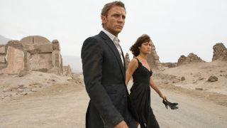 Daniel Craig and Olga Kurylenko walking in the desert in Quantum of Solace.
