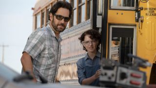 Paul Rudd and Mckenna Grace staring at a ghost trap in Ghostbusters: Afterlife.