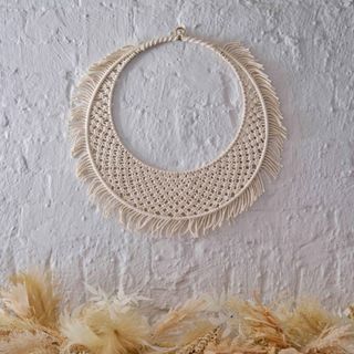 A Christmas wreath crafted in macrame style