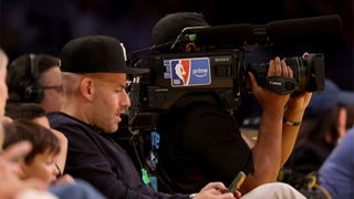 LOS ANGELES, CALIFORNIA - DECEMBER 10: A general view of the NBA and Amazon Prime logos on a broadcast camera prior to the Emirates NBA Cup quarterfinal game between the Los Angeles Lakers and the San Antonio Spurs at Crypto.com Arena on December 10, 2025 in Los Angeles, California. NOTE TO USER: User expressly acknowledges and agrees that, by downloading and/or using this Photograph, user is consenting to the terms and conditions of the Getty Images License Agreement. (Photo by Katelyn Mulcahy/Getty Images)