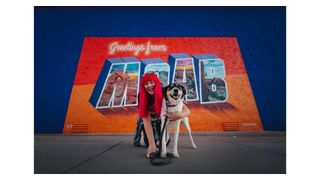 Photograph of Kaylee Greer, dog photographer and founder of non-profit organization the Dog Breath Foundation, and Val, the star the short film Val's Greatest Adventure, available to view on YouTube at https://youtu.be/vGSyMvFogxc?si=8u2B9mO-2te9_r9F