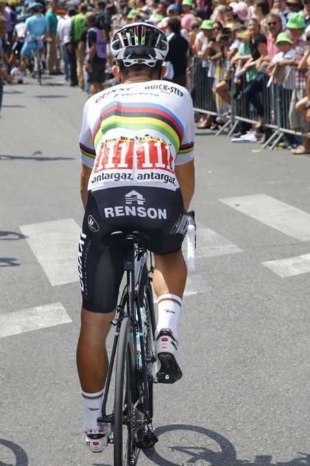 Michal Kwiatkowski rides to the start of stage 12