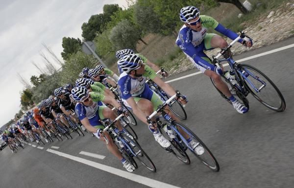 The Andalucia Caja Granada team leads the peloton.