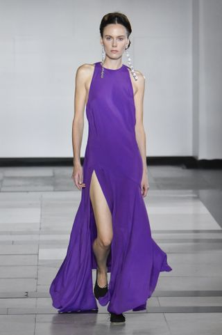 A model walks the runway wearing a sugilite purple gown at the Simone Rocha fashion show during London Fashion Week September 2024 Spring/Summer 2025.