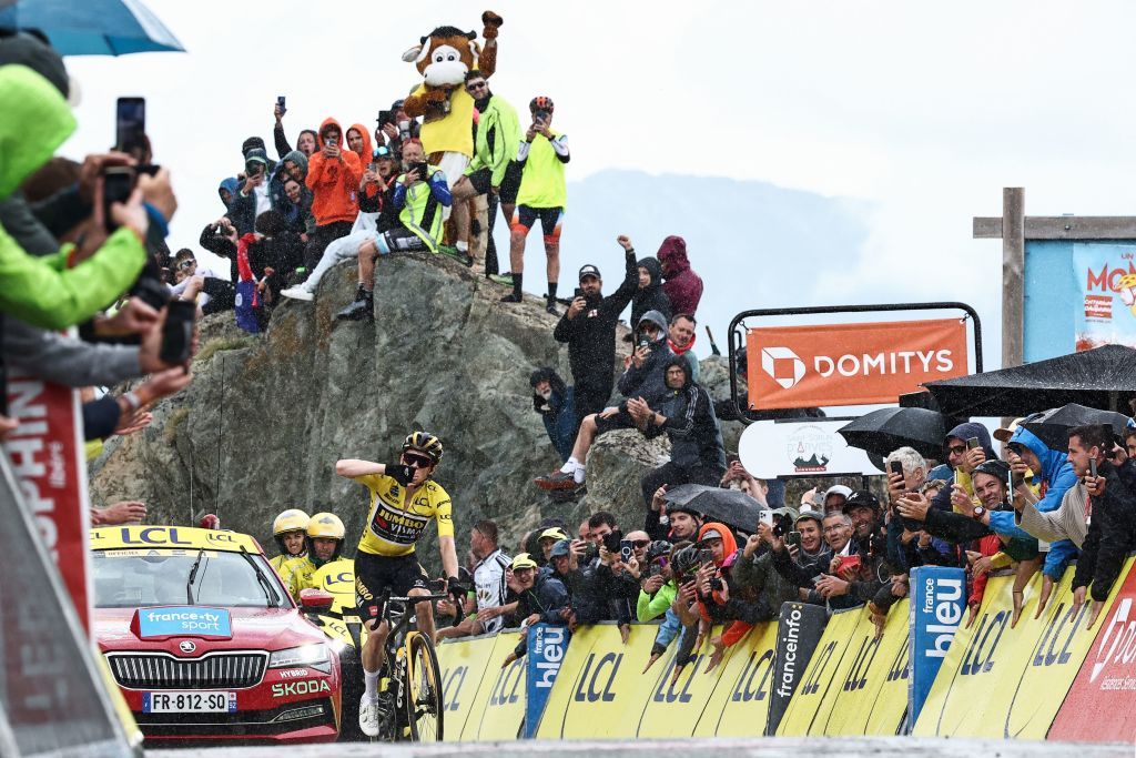 JumboVismas Danish rider Jonas Vingegaard celebrates as he crosses the finish line during the seventh stage of the 75th edition of the Criterium du Dauphine cycling race 148km between Port de Savoie to Col de la Croix de Fer Saint Sorlin France on June 10 2023 Photo by AnneChristine POUJOULAT AFP Photo by ANNECHRISTINE POUJOULATAFP via Getty Images
