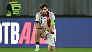 Georgia captain Khvicha Kvaratskhelia looking dejected