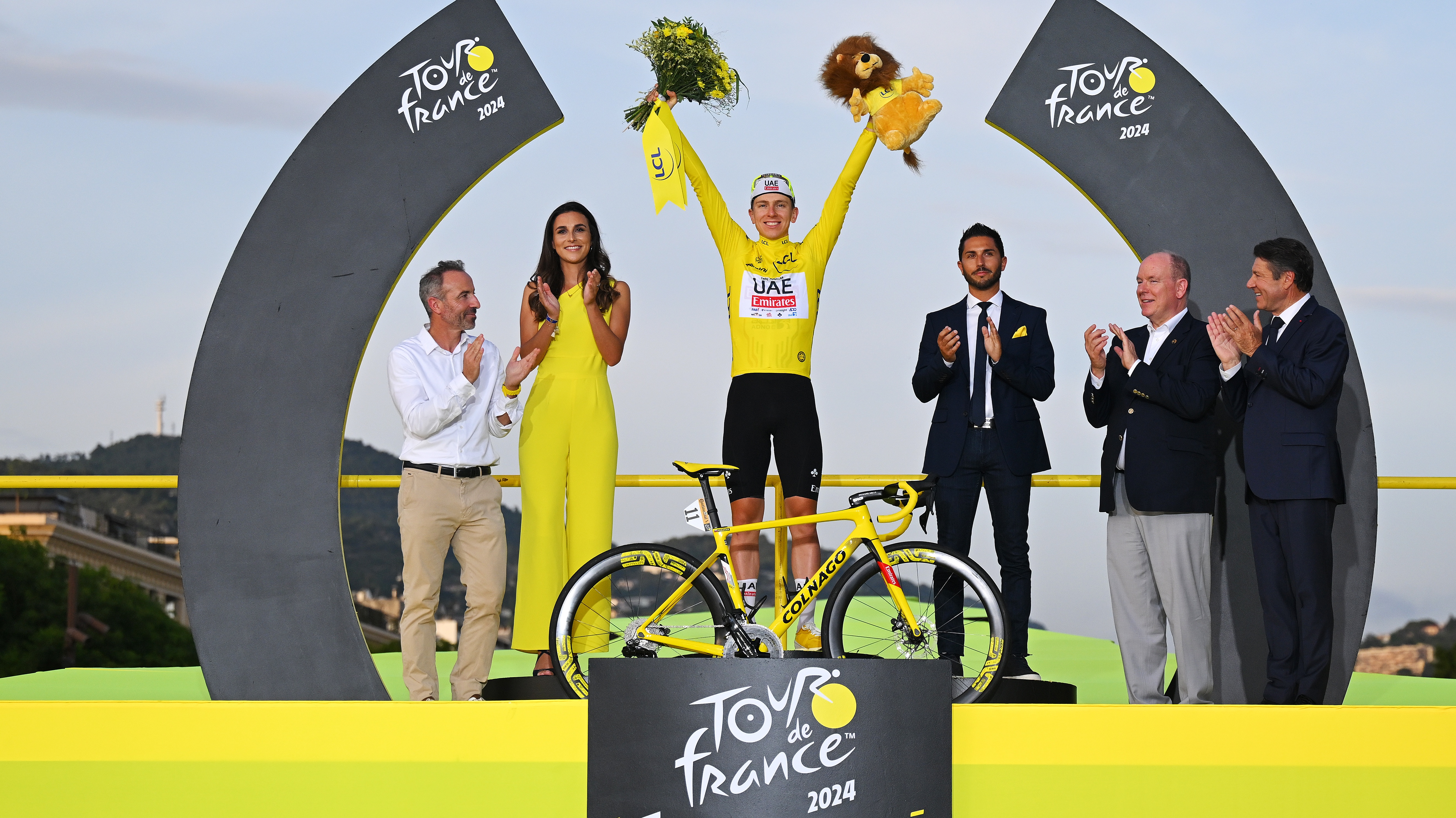 Tadej Pogacar celebrates his 2024 Tour de France victory.