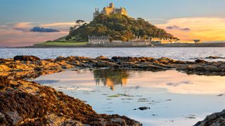View of Mounts Bay and St Michael's Mount island in Cornwall at sunset