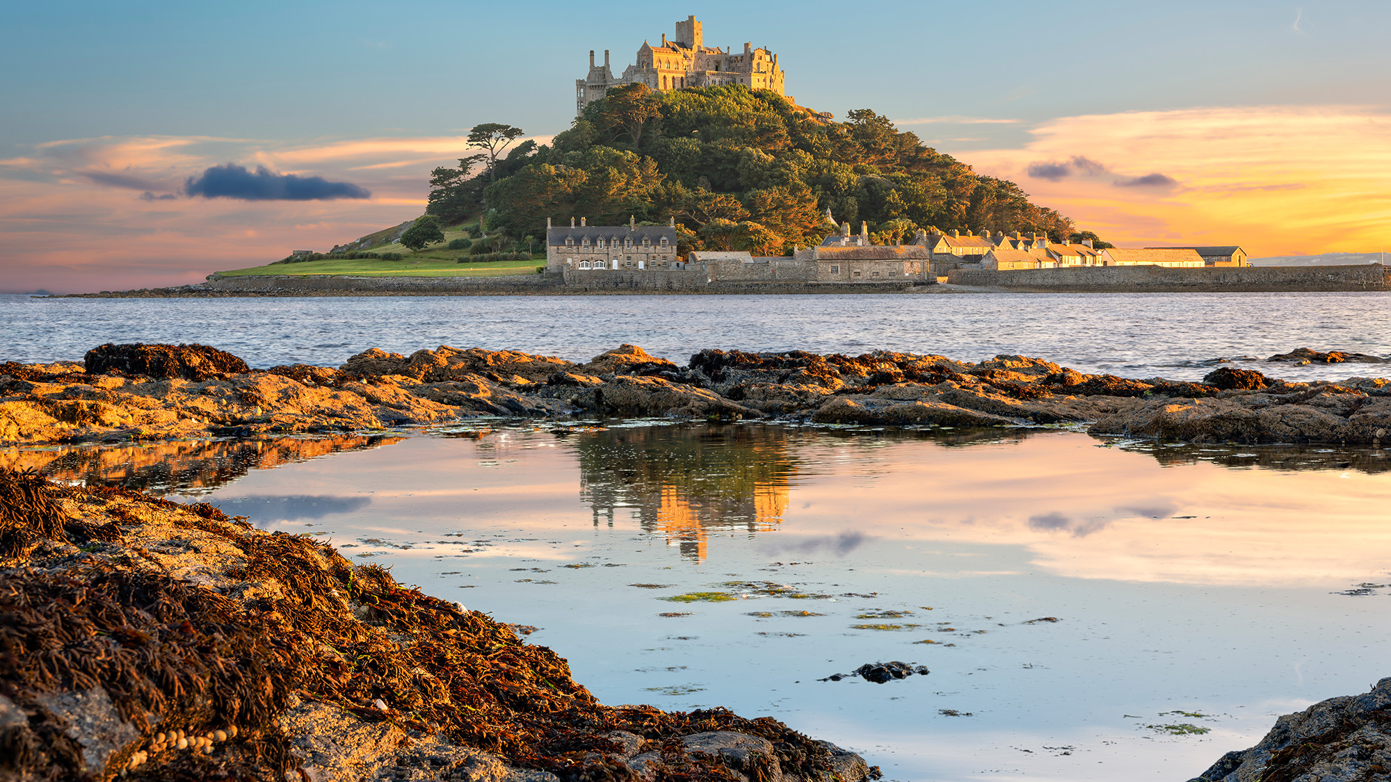 View of Mounts Bay and St Michael&#039;s Mount island in Cornwall at sunset