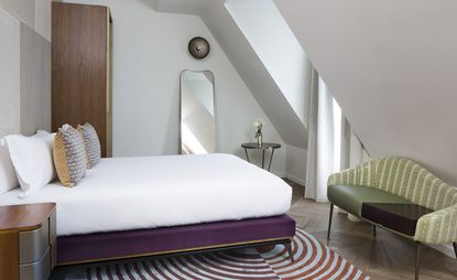 Guestroom at Maison Bréguet with sloped ceiling in Paris