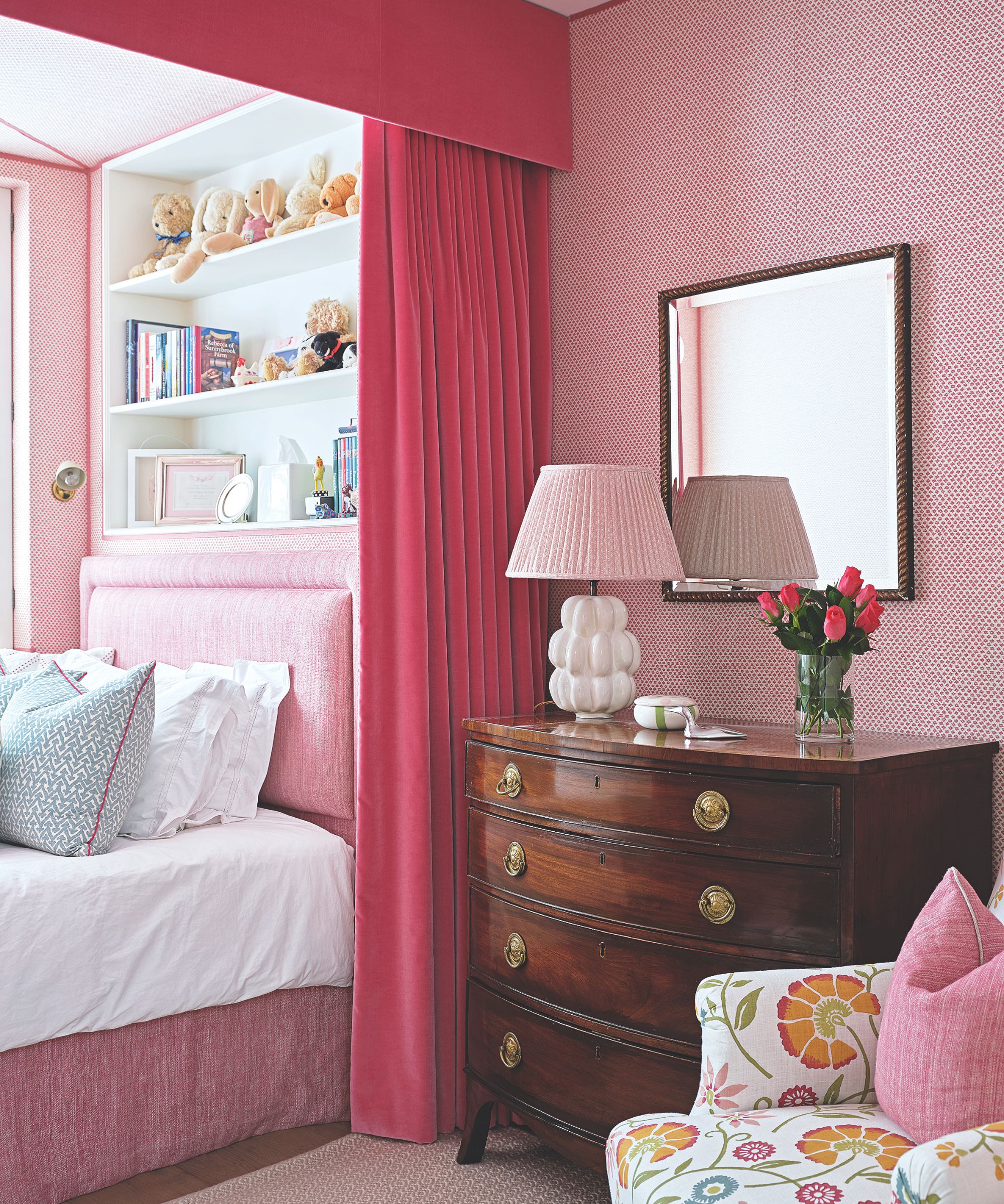 small pink bedroom with curtain