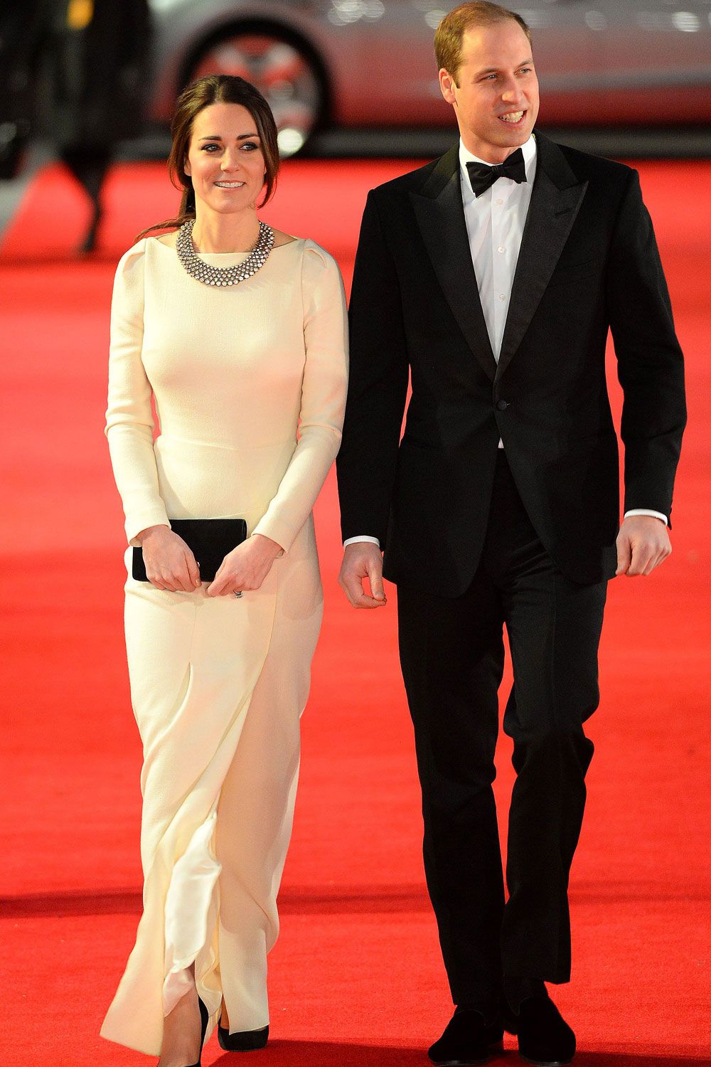 Prince William and Kate Middleton walk the red carpet at the Mandela premiere