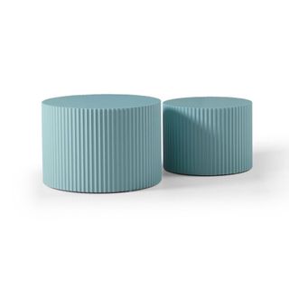 A pair of light blue nesting coffee tables