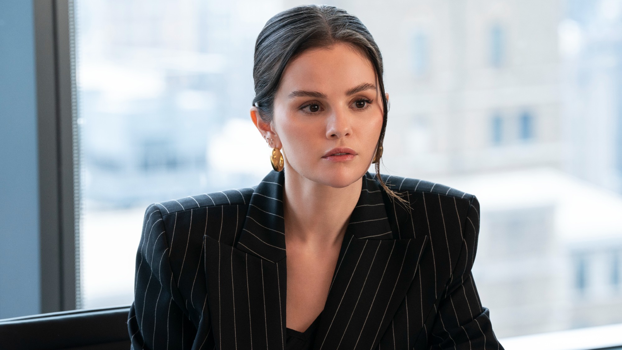 Selena Gomez looking serious in Only Murders in the Building. 