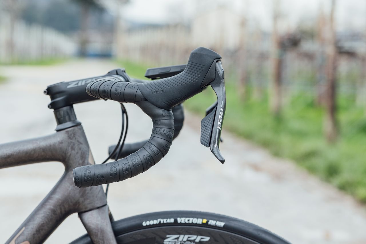 An image of the front end of a Specialized bike showing the handlebars and Sram brake levers