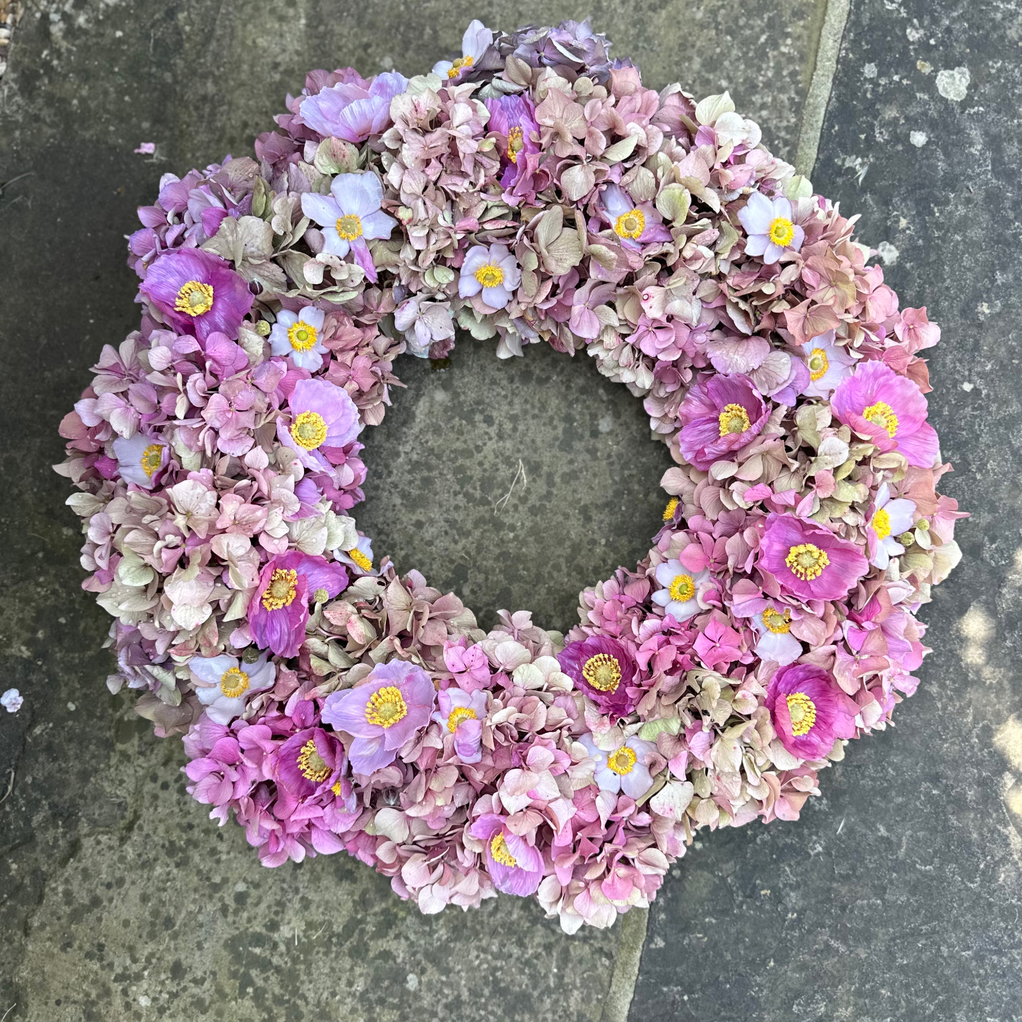 pink hydrangea wreath with anemones and poppies