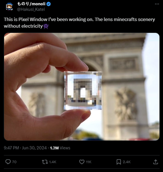 A picture of the Pixel Window pixelating the Arc de Triomphe in Paris, captioned "This is Pixel Window I’ve been working on. The lens minecrafts scenery without electricity👾"