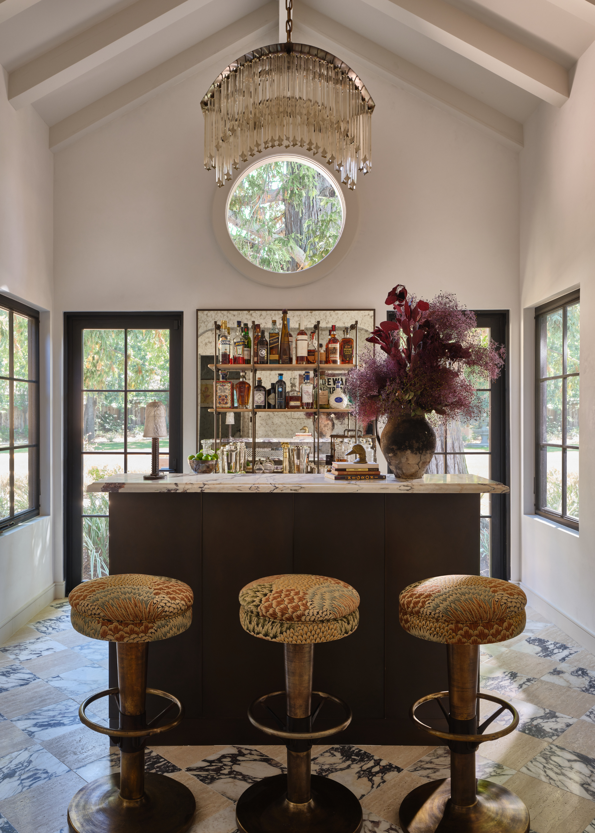 Miami-inspired bar area with marble checkerboard flooring