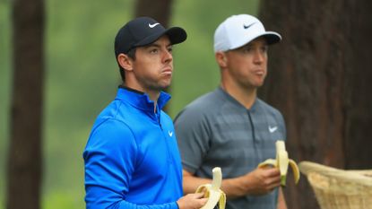 Rory McIlroy and Alex Noren eating bananas