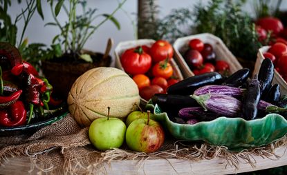 Produce table filled with fresh fruit and vegetables at Spring-To-Go in Notting Hill, London