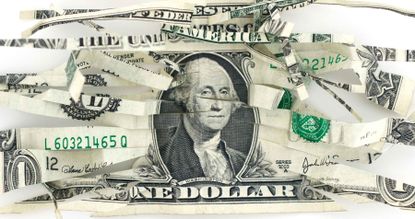 crumbled US dollar bill