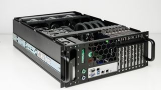 A picture of the grando comino workstation without the lid, exposing eight GPUs