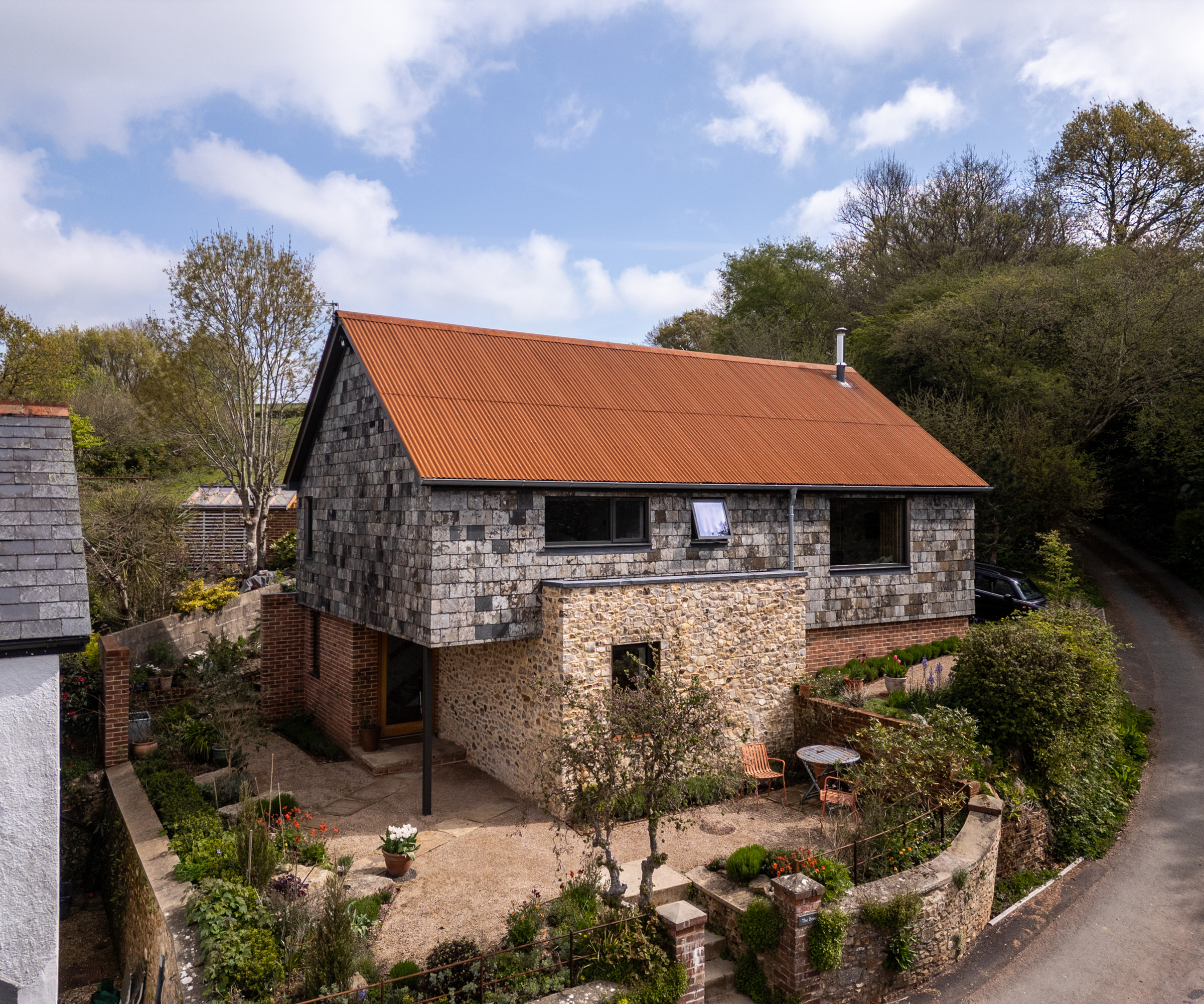 A two storey self build home clad in stone