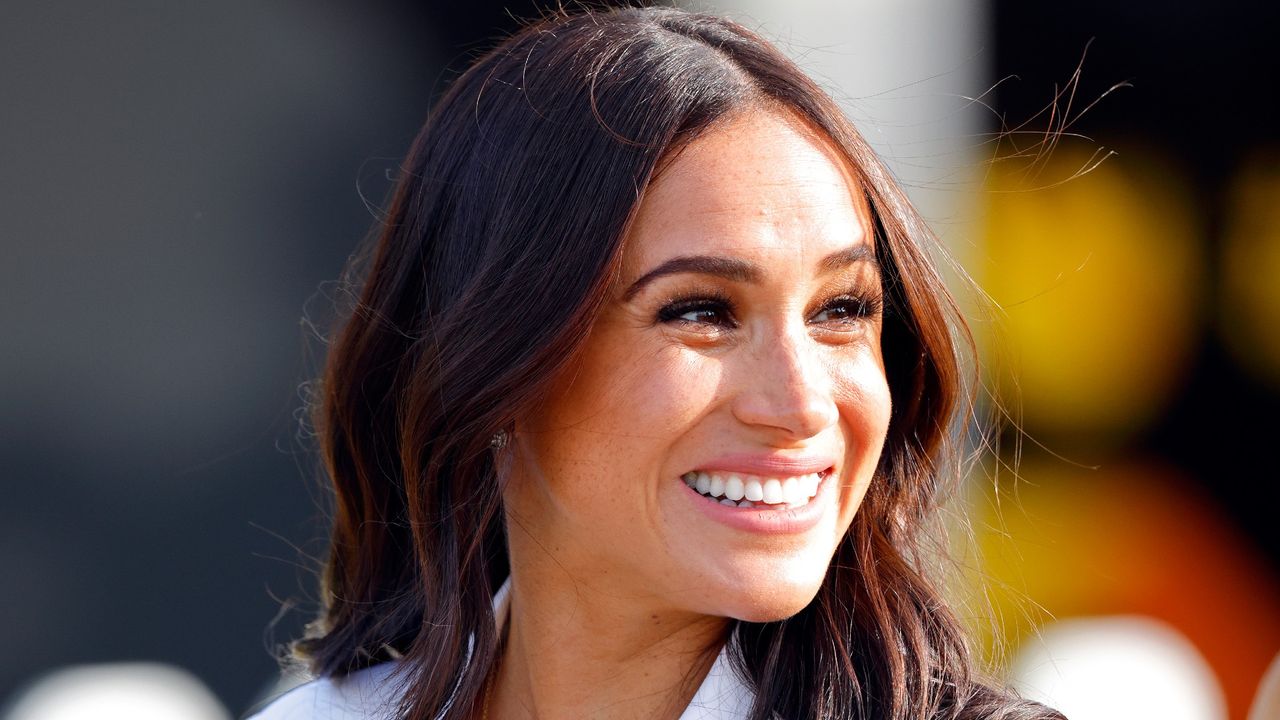 Meghan Markle&#039;s brass choker is eye-catching, seen here attending an Invictus Games Friends and Family reception