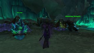 WoW Old Trunk - a shadow priest is standing in front of a cart with the Old Trunk inside