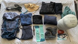 Kit for Base Camp trek spread out on a table