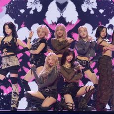 The seven members of Billlie (from left: Tsuki, Siyoon, Haram, Moon Sua, Haruna, Suhyeon, and Sheon) perform in front of an LED screen, on Apple TV+'s 'KPOPPED.'