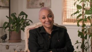 Raven-Symone sitting for an interview in Call Me Miss Cleo