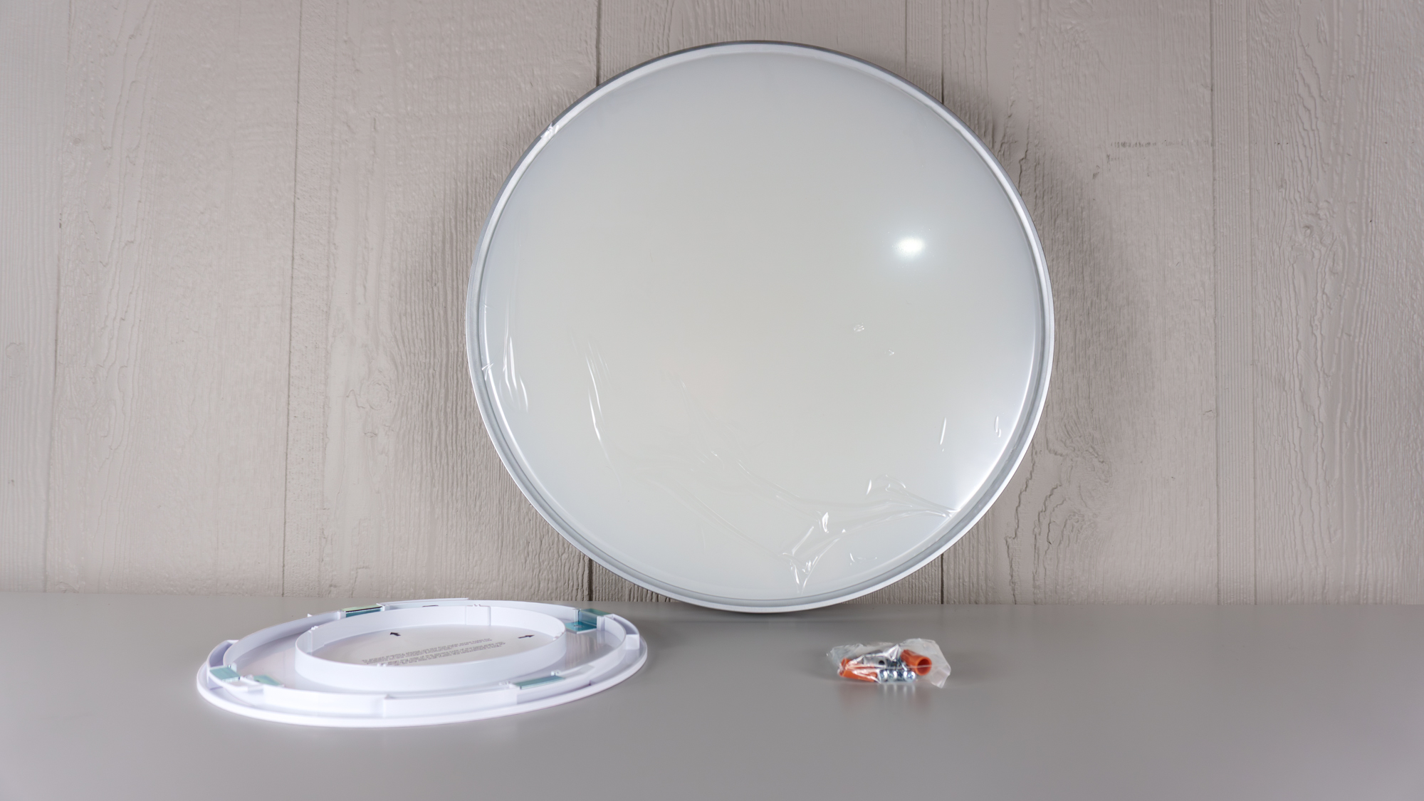 The Govee Ceiling Light Ultra unboxed on a table