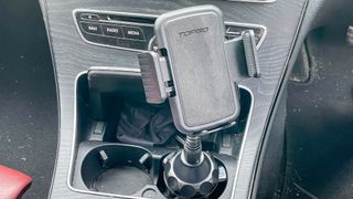 TOPGO Cup Holder Phone Mount shown on a car dash