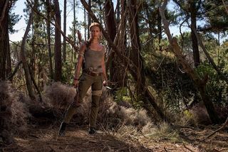 Alicia Vikander as Lara Croft with bow and arrow