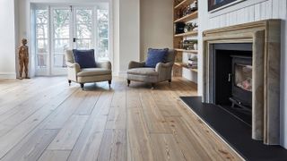 pale reclaimed wood floor in living room