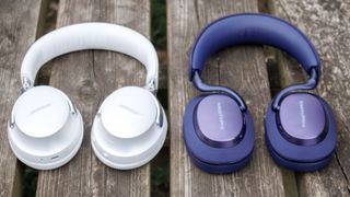 Bowers & Wilkins Px7 S3 vs Bose QuietComfort Ultra Headphones one wooden surface