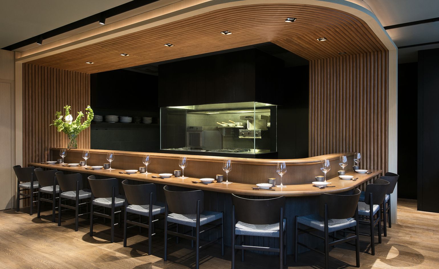 Seating with a view of Plum & Toro's kitchen, Singapore