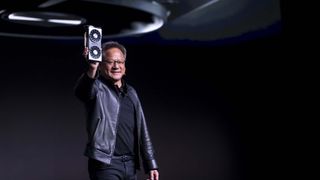 Jen-Hsun Huang, president and chief executive officer of Nvidia Corp., holds up the new Nvidia GeForce RTX 2060 graphics processor during the company's event at the 2019 Consumer Electronics Show (CES) in Las Vegas, Nevada, U.S., on Sunday, Jan. 6, 2019.