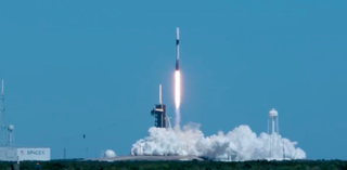 A SpaceX Falcon 9 rocket launches the crewed Ax-1 mission toward the International Space Station on April 8, 2022.