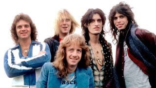 Aerosmith posing for a photograph in 1977