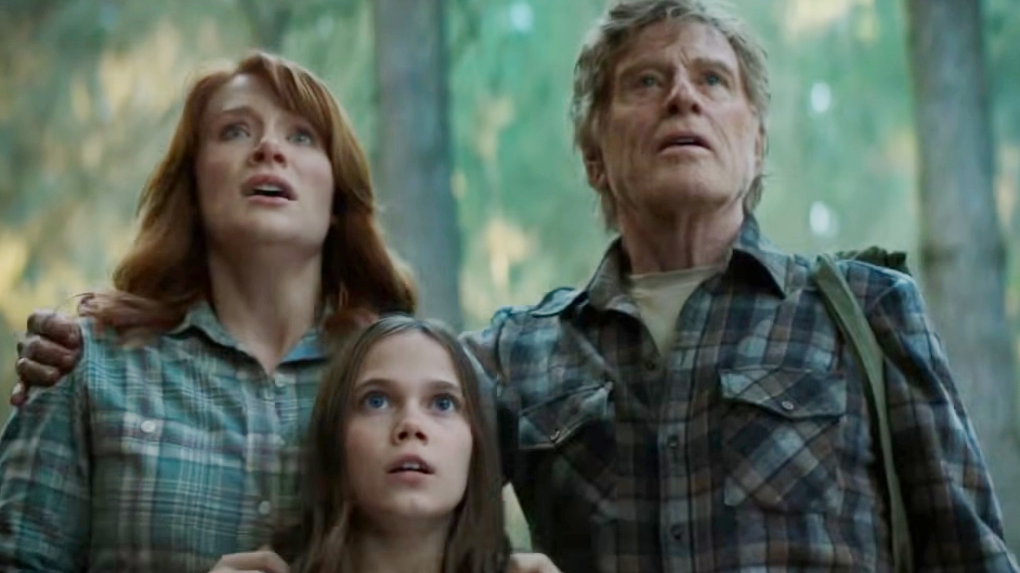 Robert Redford with his hand on Bryce Dallas Howard's shoulder in Pete's Dragon