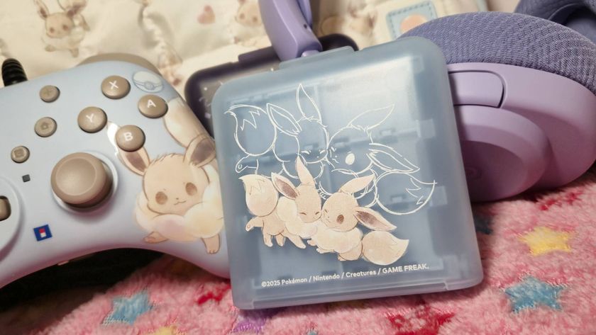 Close up of the Hori Eevee Cottage Core Game Case with cute Switch 2 accessories sitting behind it.
